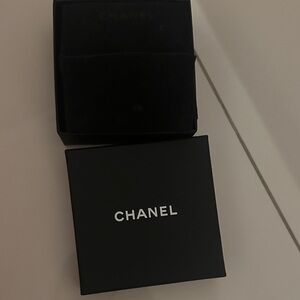 Chanel box. I belive my pendant came with it.